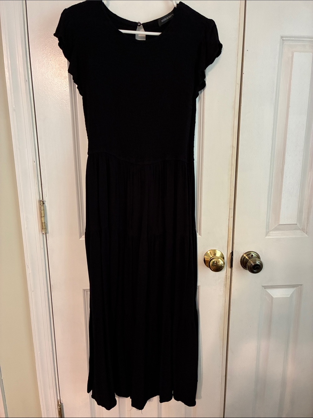 Elegant Black Maxi Dress with Tiered Skirt